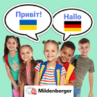 Schulkinder mit Sprechblasen: Hallo auf Deutsch und Ukrainisch
Mildenberger-Schriftzug 